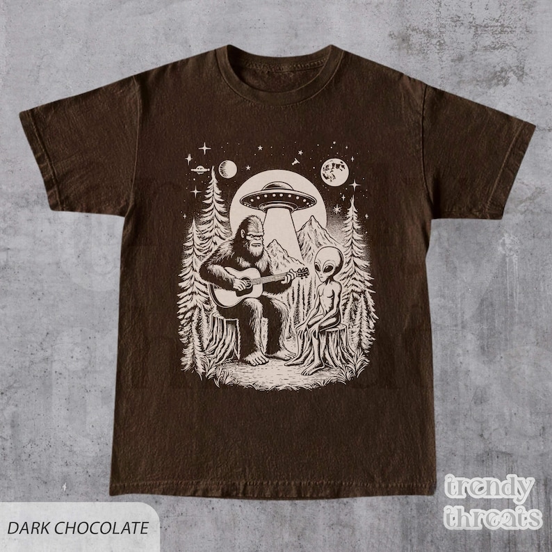 Bigfoot Plays Guitar with Alien and UFO Shirt - Dark Chocolate