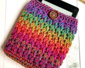 May include: A rainbow crochet e-reader case with a wooden button closure.