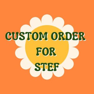 May include: A custom order graphic on an orange background. The design features a daisy with a yellow center and white petals. The text "CUSTOM ORDER FOR STEF" is in green, outlined in white.