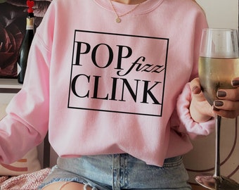 Suéter de Navidad / Suéter de Nochevieja / Sudadera de champán / Navidad retro / Pop Fizz Clink