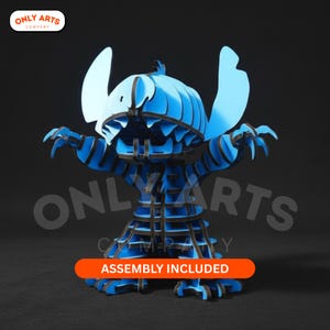 Puede incluir: Rompecabezas 3D azul y negro de un personaje de dibujos animados con grandes orejas y garras. El rompecabezas está hecho de piezas en capas y tiene el texto "ASSEMBLY INCLUDED" en una pancarta naranja. El logotipo de Only Arts Company está en la esquina superior izquierda.