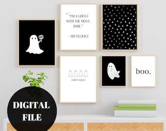 May include: Set of five black and white printable Halloween themed wall art prints. The prints feature ghosts, the text "boo", and the quote "I'm a ghost with the most, babe." from the movie Beetlejuice.