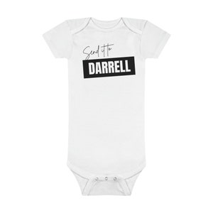 May include: White baby onesie with black text that reads "Send it to Darrell" in a handwritten font.