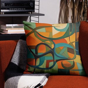 Original abstract art painting in mid century modern tones of olives, rusts, teals and blue, featuring boomerangs and geometric shapes, vibrantly printed on both sides of this linen textured pillow cover. It has a hidden black zipper for easy removal, cover is preshrunk and machine washable. MCM.