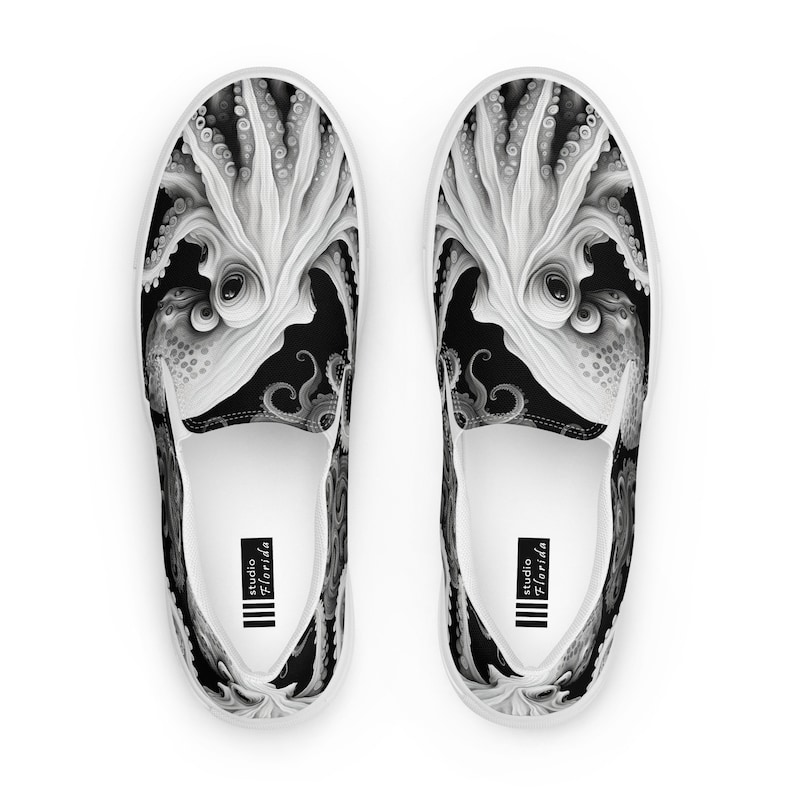 Black, white and grays combine to create these swirling, tentacled arms of this sea monster. Kraken? Octopus? Squid?  The pattern covers the front, side and back panels. The monster peeks over the heels to leave a lasting impression as you walk away.