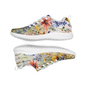 Women's Watercolor Wildflowers Sneakers : Athleisure Casual Shoes, Lightweight, Lace-up, Floral, Flowers. Vibrant watercolor wildflowers in shades of orange, blue, yellow, and pink, with green leaves and foliage, against a crisp white background. Bright white inner and outer soles, trim and shoelaces. The upper is a ultralight knit weave. These casual shoes are perfect for travel, shopping, running errands or just hanging out. Super lightweight and comfortable.