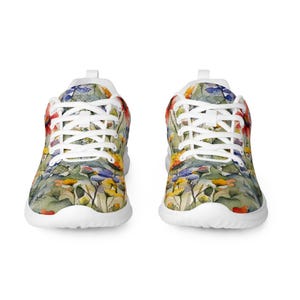 Women's Watercolor Wildflowers Sneakers : Athleisure Casual Shoes, Lightweight, Lace-up, Floral, Flowers. Vibrant watercolor wildflowers in shades of orange, blue, yellow, and pink, with green leaves and foliage, against a crisp white background. Bright white inner and outer soles, trim and shoelaces. The upper is a ultralight knit weave. These casual shoes are perfect for travel, shopping, running errands or just hanging out. Super lightweight and comfortable.