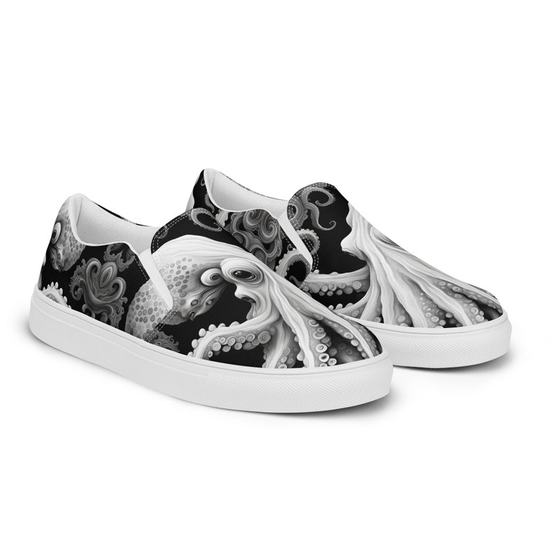 Black, white and grays combine to create these swirling, tentacled arms of this sea monster. Kraken? Octopus? Squid?  The pattern covers the front, side and back panels. The monster peeks over the heels to leave a lasting impression as you walk away.