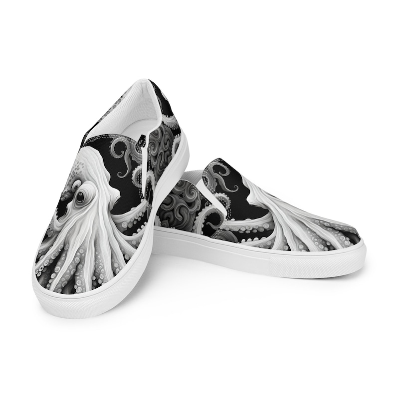 Black, white and grays combine to create these swirling, tentacled arms of this sea monster. Kraken? Octopus? Squid?  The pattern covers the front, side and back panels. The monster peeks over the heels to leave a lasting impression as you walk away.