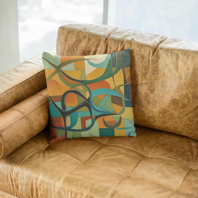 Original abstract art painting in mid century modern tones of olives, rusts, teals and blue, featuring boomerangs and geometric shapes, vibrantly printed on both sides of this linen textured pillow cover. It has a hidden black zipper for easy removal, cover is preshrunk and machine washable. MCM.