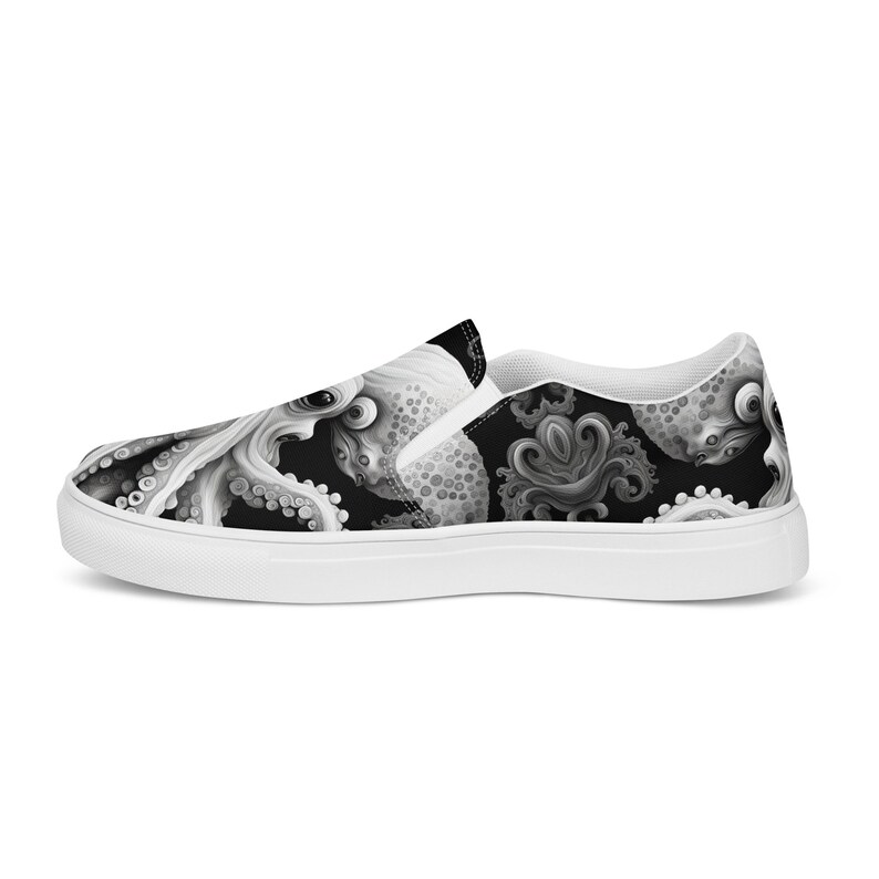 Black, white and grays combine to create these swirling, tentacled arms of this sea monster. Kraken? Octopus? Squid?  The pattern covers the front, side and back panels. The monster peeks over the heels to leave a lasting impression as you walk away.