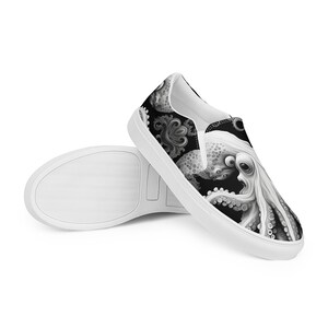 Black, white and grays combine to create these swirling, tentacled arms of this sea monster. Kraken? Octopus? Squid?  The pattern covers the front, side and back panels. The monster peeks over the heels to leave a lasting impression as you walk away.