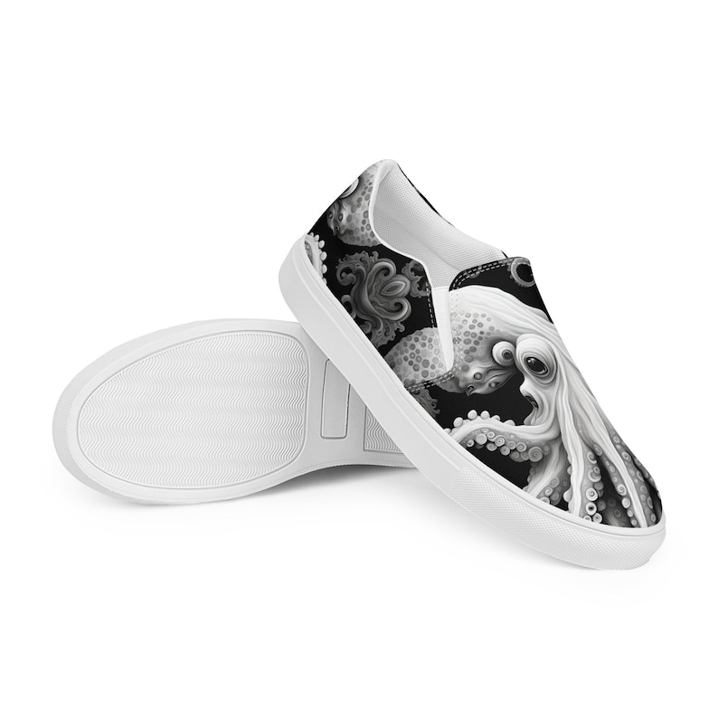 Black, white and grays combine to create these swirling, tentacled arms of this sea monster. Kraken? Octopus? Squid?  The pattern covers the front, side and back panels. The monster peeks over the heels to leave a lasting impression as you walk away.