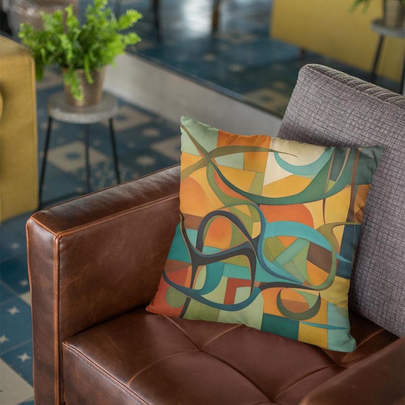 Original abstract art painting in mid century modern tones of olives, rusts, teals and blue, featuring boomerangs and geometric shapes, vibrantly printed on both sides of this linen textured pillow cover. It has a hidden black zipper for easy removal, cover is preshrunk and machine washable. MCM.
