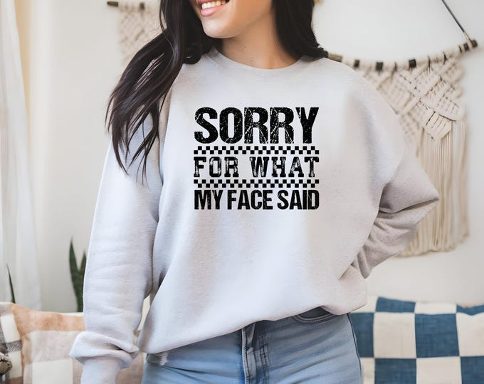 Sarcastic Graphic Tee: "Sorry For What My Face Said" Distressed Checkered Design