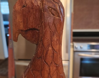 Hand carved wooden parrot.