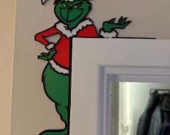 Decoración navideña para puerta o marco de fotos impresa en 3D estilo Grinch