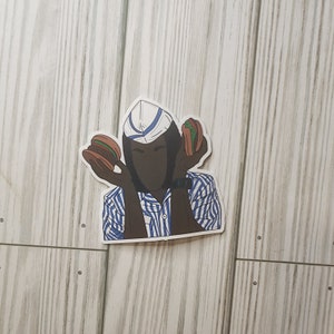May include: A sticker of a person wearing a blue and white striped shirt and a white hat, holding two hamburgers.