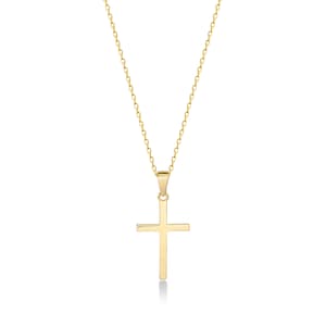 May include: A gold chain necklace with a simple, plain cross pendant.