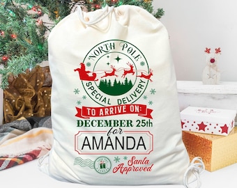 May include: A white canvas Santa sack with a red and green design that says "North Pole Special Delivery" and "To Arrive On: December 25th for Amanda" with a Santa Approved stamp.