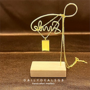 Collana con ciondolo minimalista e di nicchia, conchiglia diagonale in acciaio inossidabile, sole, stelle e tarocchi.