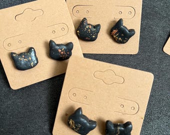 Pendientes de gatito negros y dorados