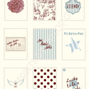 May include: Nine framed art prints with diverse designs. The prints feature a red carnation, a toile scene, a sorority crest, a postcard with text, blue striped text, a star, angel wings, red polka dots, and playing card with text.