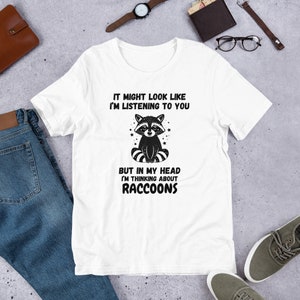 I&#39;m thinking about Raccoons Unisex t-shirt, funny raccoon lover t-shirt, humorous raccoon tee, mischief enthusiast shirt, raccoon lover gift
