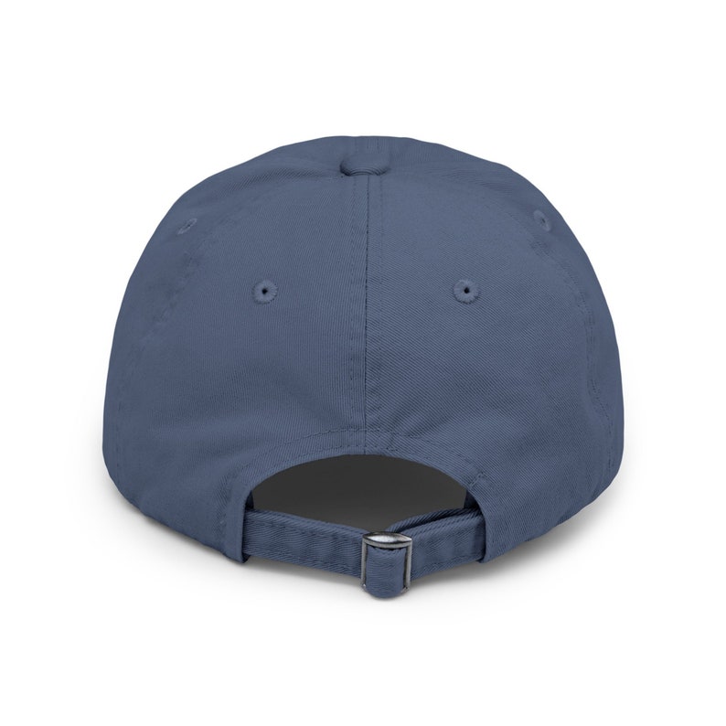 May include: A solid blue baseball cap with a buckle closure on the back.