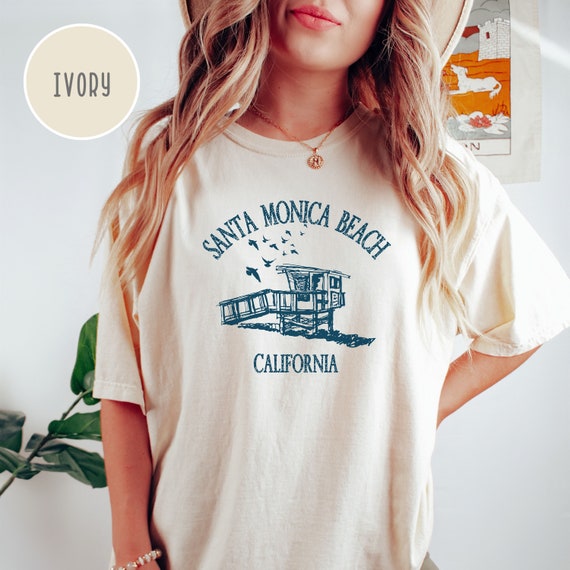 Santa Monica - santamonica 古着 remake frill shirt Santa Monica Native Tee — Olympia Club