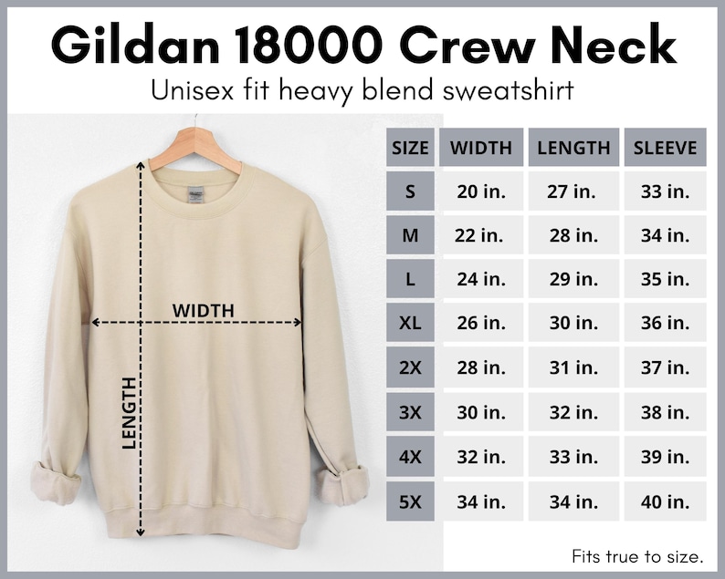 May include: A beige Gildan 18000 Crew Neck unisex heavy blend sweatshirt hanging on a wooden hanger. The image includes a size chart with measurements in inches for width, length, and sleeve length, ranging from size S to 5X.