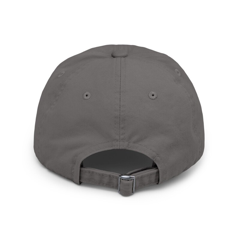 May include: A solid gray baseball cap with a buckle closure on the back.