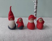 Set of four tiny vintage elves from Sweden.