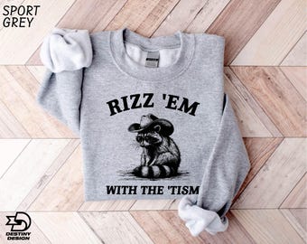 Rizz Em With The Tism Sweatshirt, Funny Raccoon Graphic Sweatshirt, Autism Awareness Shirt, Funny Gift For Her & Him, Raccoon Meme Shirt