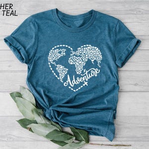 a t - shirt with the words adventure printed on it