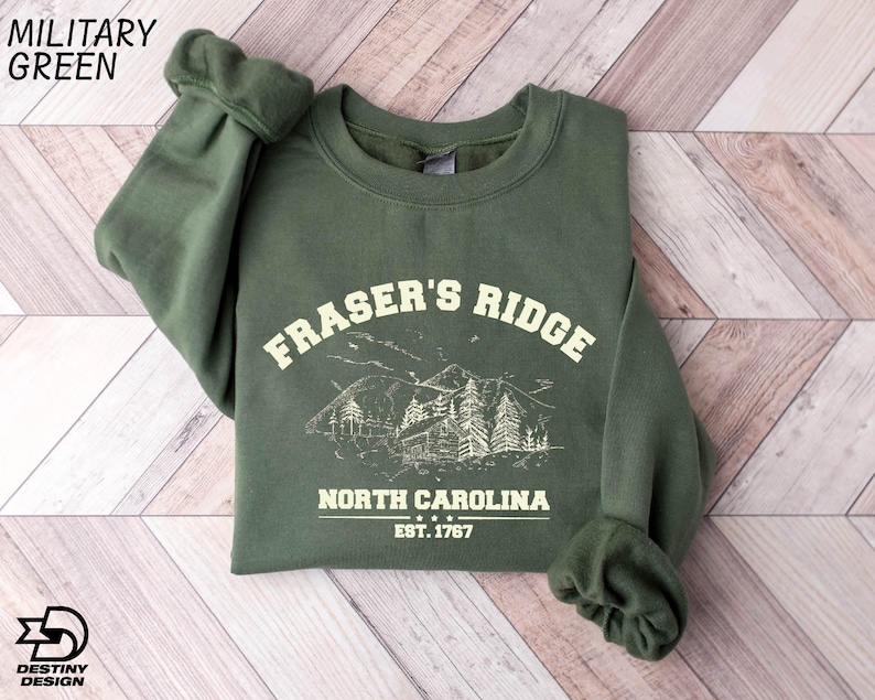 a green sweatshirt with the words fraser's ridge on it