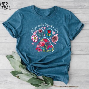 a t - shirt with a dog's paw on it