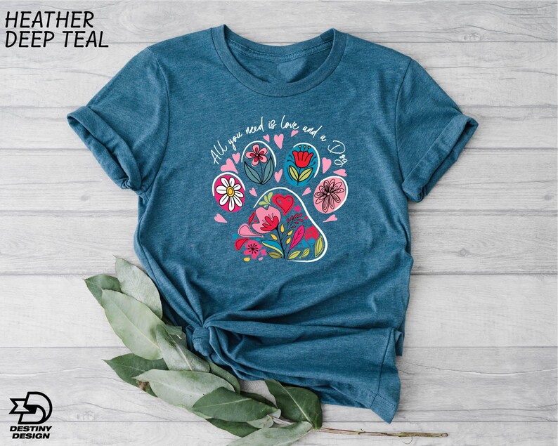 a t - shirt with a dog's paw on it