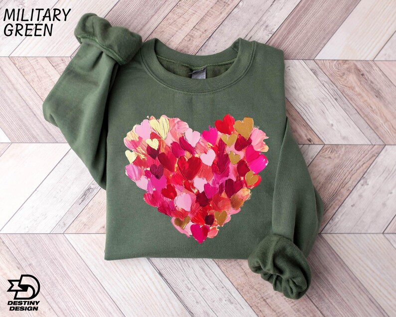a green shirt with a heart made out of hearts