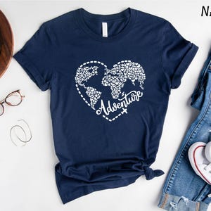 a t - shirt with the words adventure written in a heart