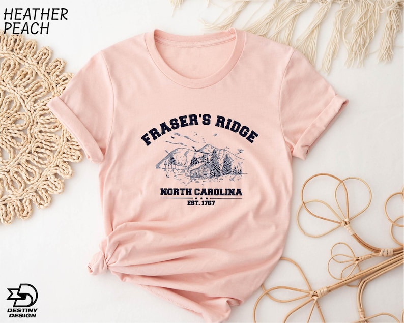 a pink t - shirt with the words fraser's ridge north carolina on
