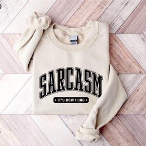 a sweatshirt with the word garccasm on it