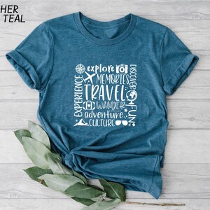 a blue t - shirt with the words travel on it