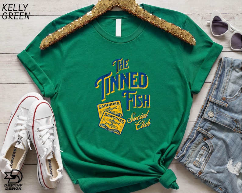a green t - shirt with the words the sponged fish on it