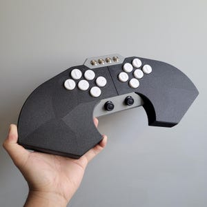 May include: A set of three ceramic vases in varying heights and shapes. The vases are glazed in a matte white finish, offering a minimalist aesthetic. The tallest vase is approximately 25 cm high.