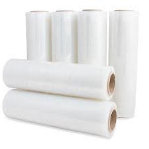 May include: Several rolls of clear plastic stretch wrap are arranged against a white background. The rolls are cylindrical, with a cardboard core visible at each end. The plastic appears tightly wound and ready for use, suggesting packaging or wrapping purposes.