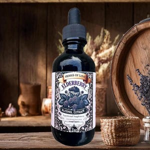 May include: A dark glass bottle of elderberry alcohol extract with a black dropper top. The label features the text "Herbs of Love" and "Elderberry Alcohol Extract Nutritional Supplement." The bottle is 2 oz.