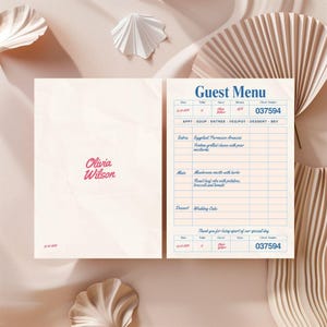 Op de afbeelding: Een trouwmenu met de tekst "Guest Menu" in blauw. Het menu bevat voorgerechten, hoofdgerechten en dessertopties. De naam "Olivia Wilson" staat in roze aan de linkerkant. Het controlenummer is 037594.