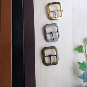 Full-grain leather belt with brass buckle statement buckle. 1.5-inch wide leather belt. Handmade In Canada
