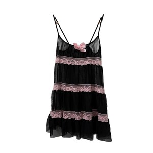 May include: Black babydoll lingerie with pink lace trim and a matching bow. The sheer fabric is layered with three tiers of pink lace. The straps are thin and adjustable.